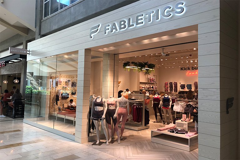 Fabletics store with mannequins in workout outfits