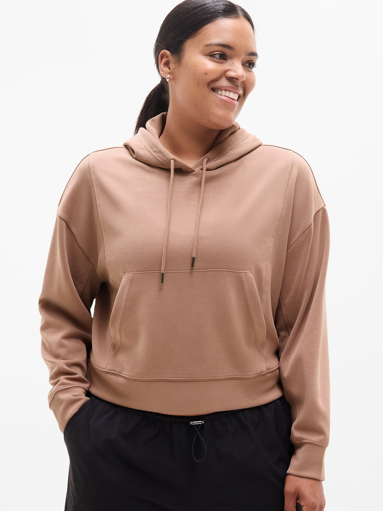 Brown hoodie with black pants
