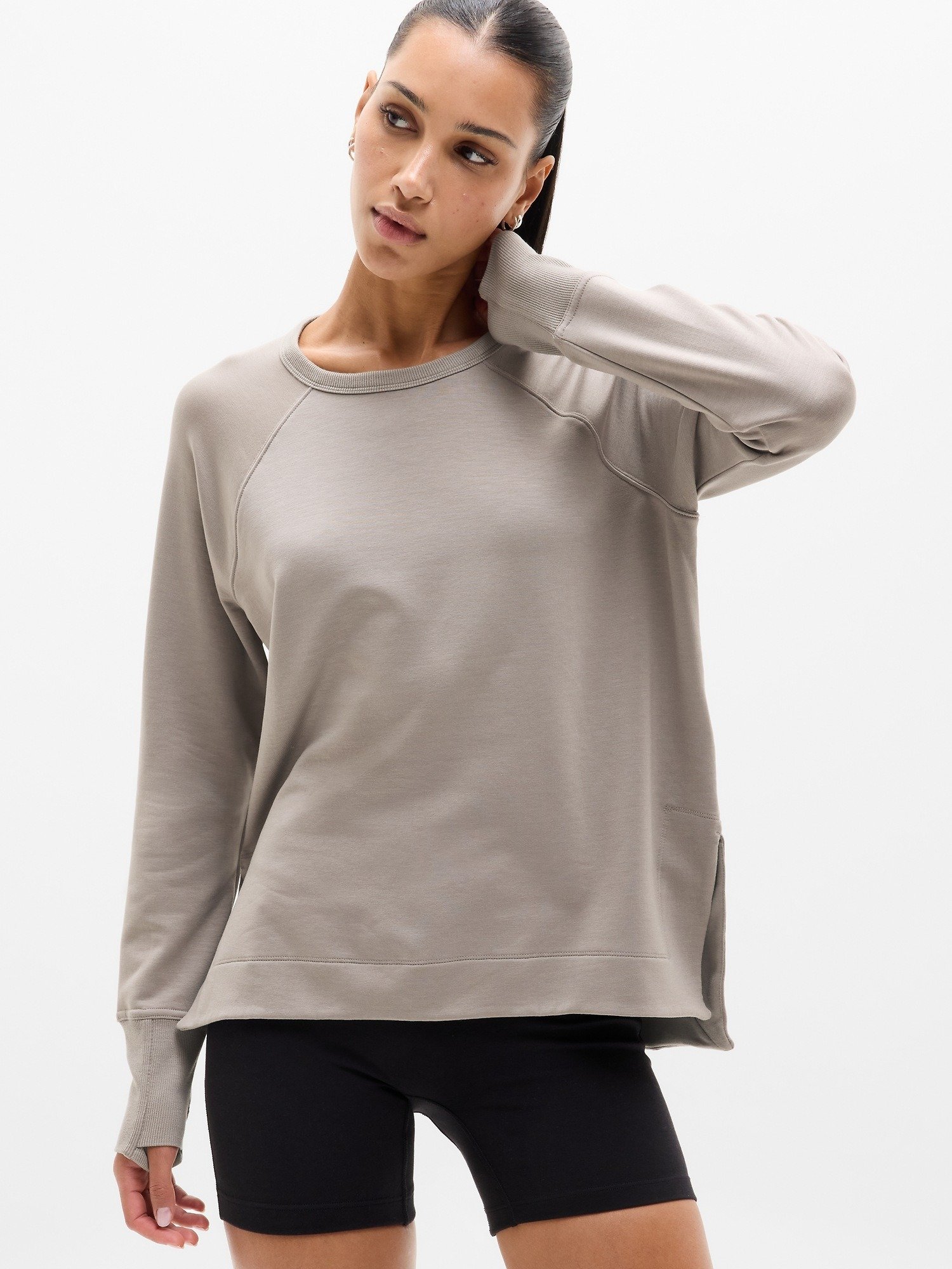 Grey sweatshirt with black shorts