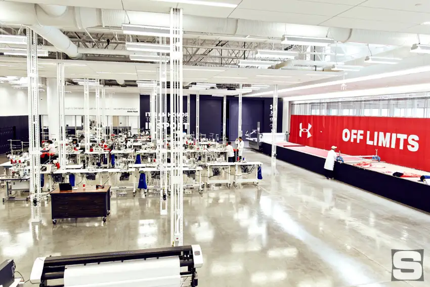 Under Armour production line with technical fabrics and sewing machinery
